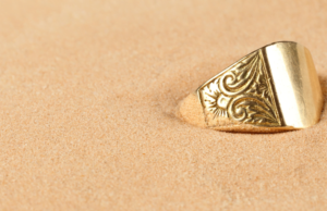 Woman Finds Ring In Sand And Realizes That It’s 100 Years Old